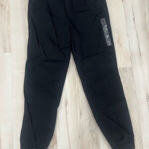 Youth casual pants . 2 pairs . Black and khaki. Both pairs for $25